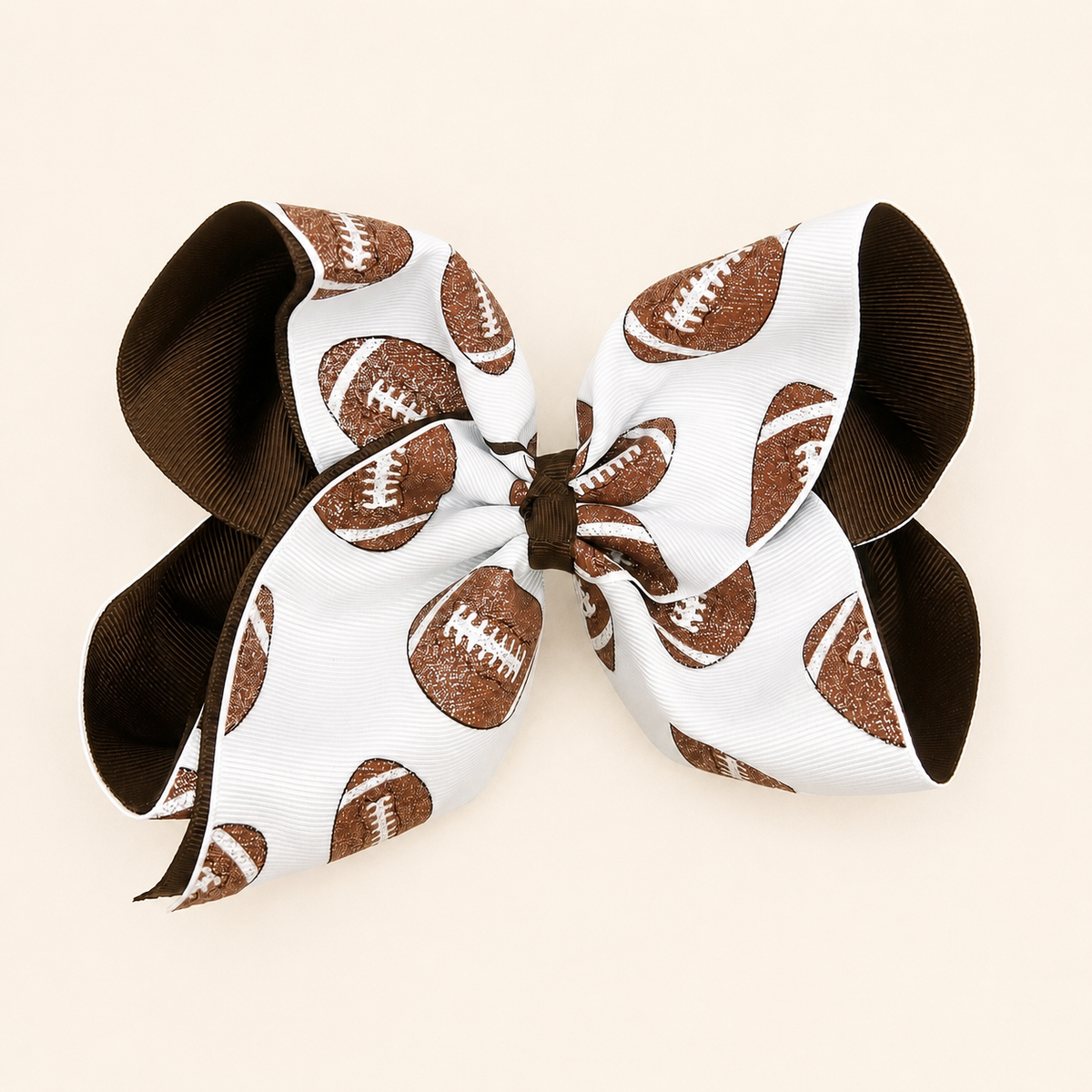 Pretty in Pigskin Bow